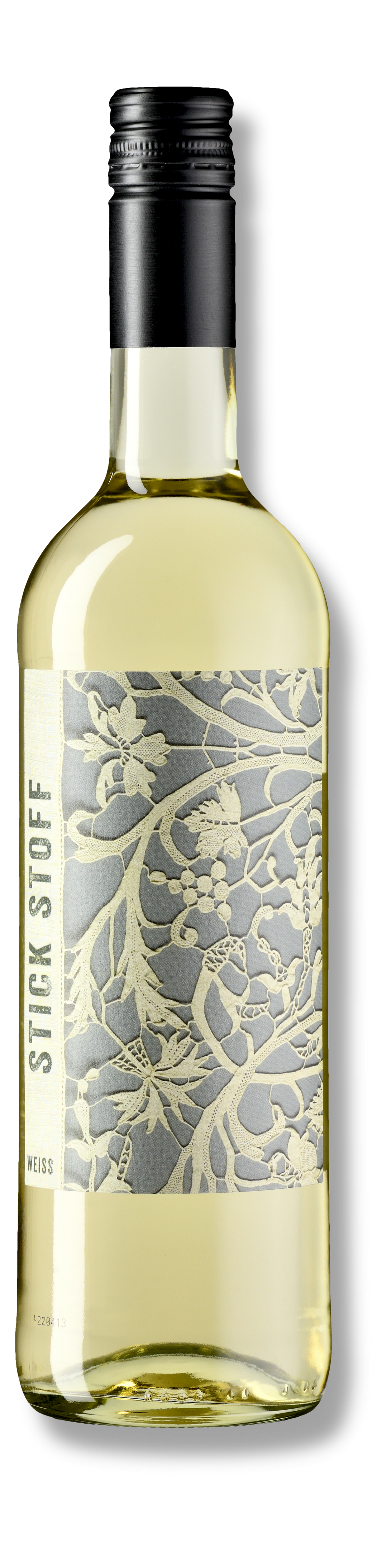 Stick Stoff Cuvée Weiss – elegante Schweizer Weisswein-Flasche mit zart filigranem Textilmotiv-Etikett, Rebsorten Müller-Thurgau & Blanc de Noirs.